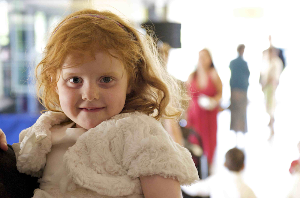 Young guest at the wedding of Tammy and Nick taken by Cambridge based photographer Richard Bowring