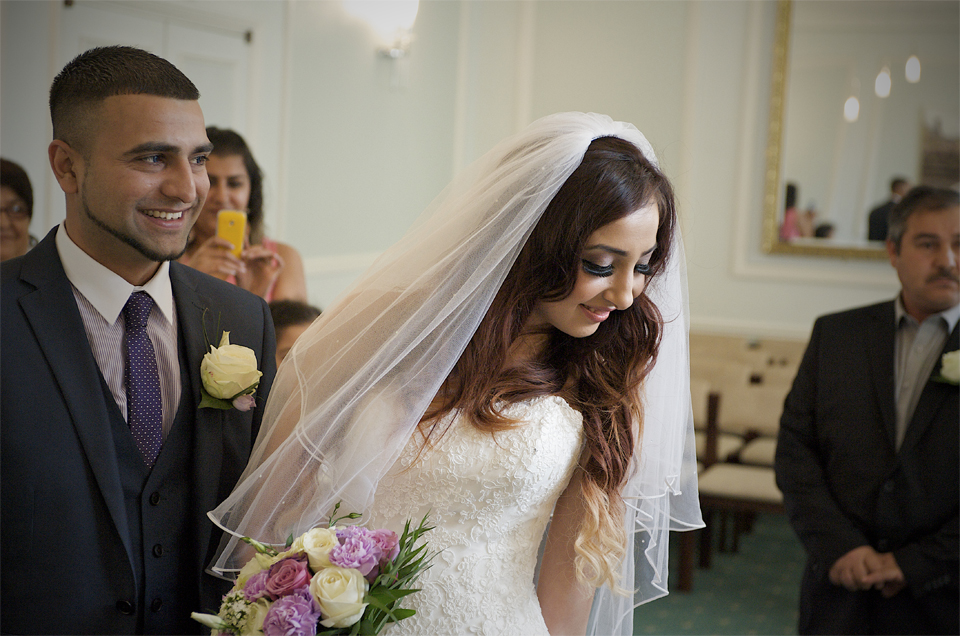 Moment during the ceremony of the wedding of Adnan and Jasmina by the cambridge based photographer and illiustrator Richard Bowring